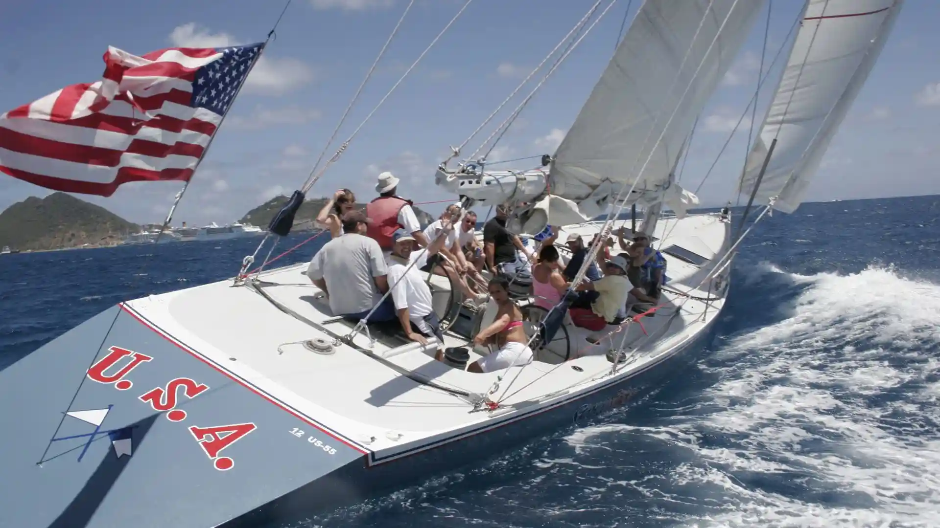 Former America's Cup racing yachts sailing side by side off Philipsburg, Sint Maarten
