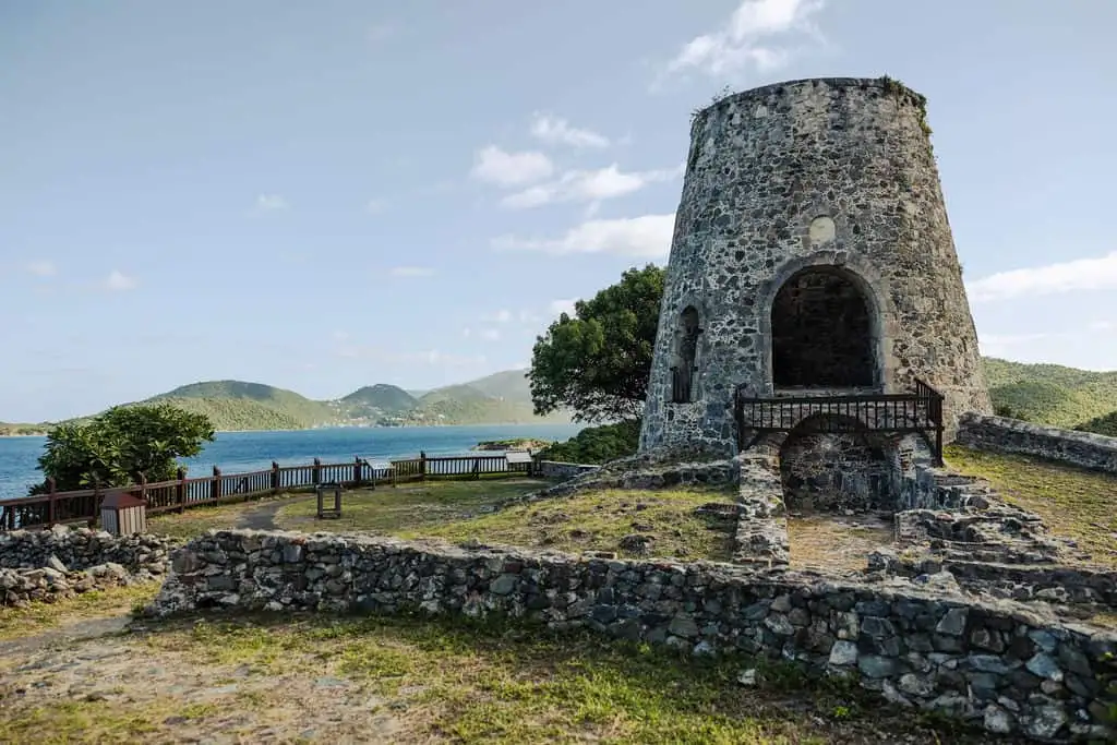 Stone windmill tower of the Annaberg sugar plantation ruins overlooking Leinster Bay, St. John