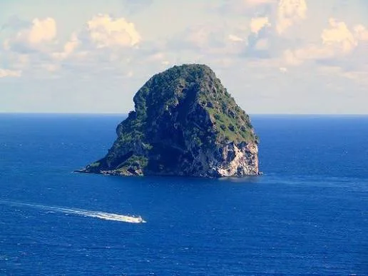 Diamond Rock, a huge volcanic rock rising from the sea off Le Diamant, Martinique