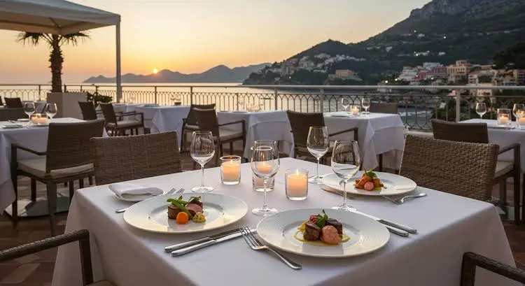 Elegant beach restaurant table set with wine and seafood overlooking the sea in Saint Barthelemy