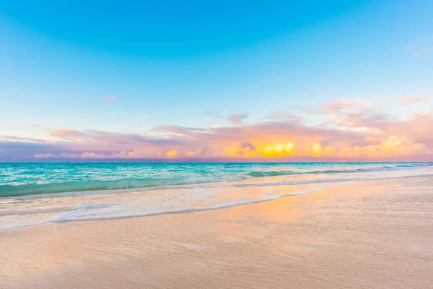 Long stretch of powdery white sand and calm turquoise water at Grace Bay Beach, Providenciales