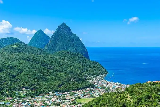 The twin volcanic peaks of Gros Piton and Petit Piton rising from the sea near Soufriere, Saint Lucia