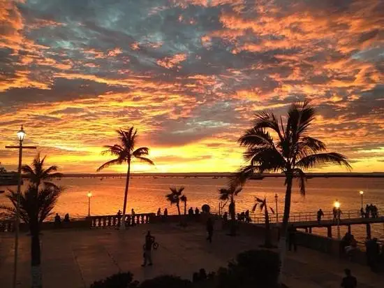 Waterfront malecón promenade in San Miguel de Cozumel at sunset