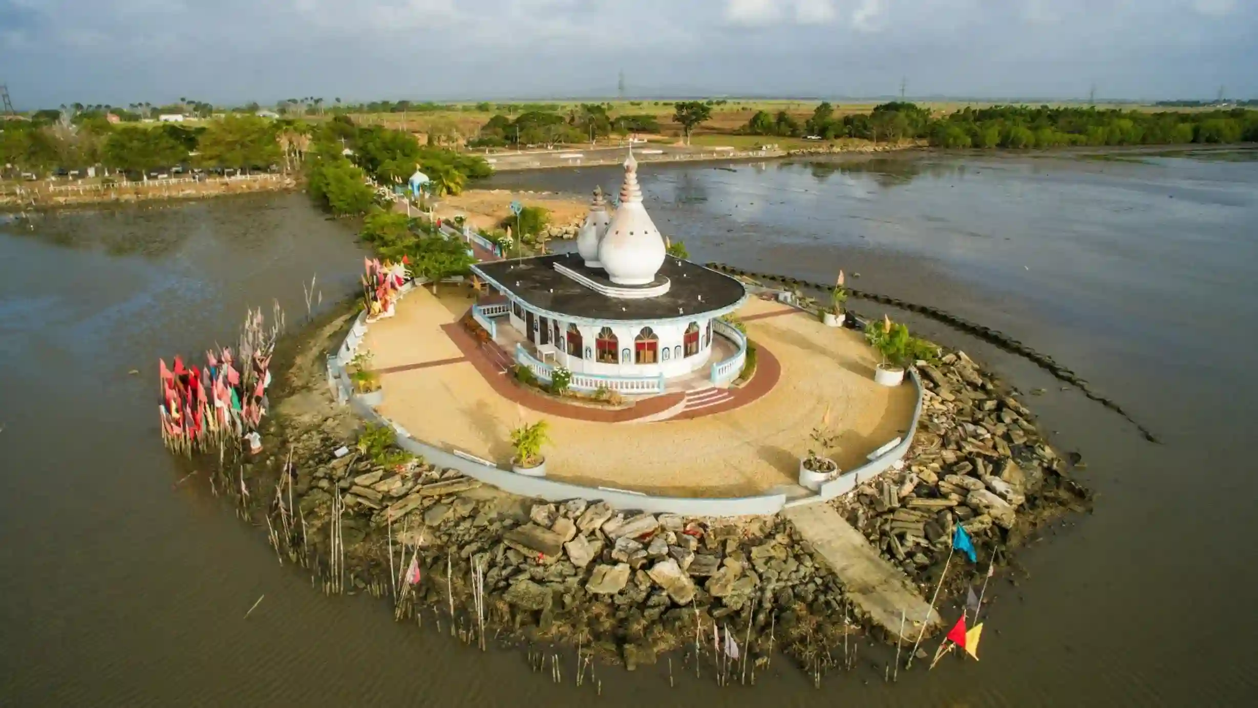 White Hindu temple built on a causeway over the sea at Waterloo, Trinidad
