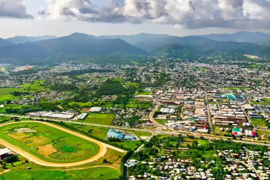 Green forested mountains of Trinidad's Northern Range dropping to the sea along the north coast